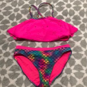 A pink mermaid bathing suit